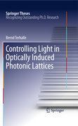 Controlling light in optically induced photonic lattices